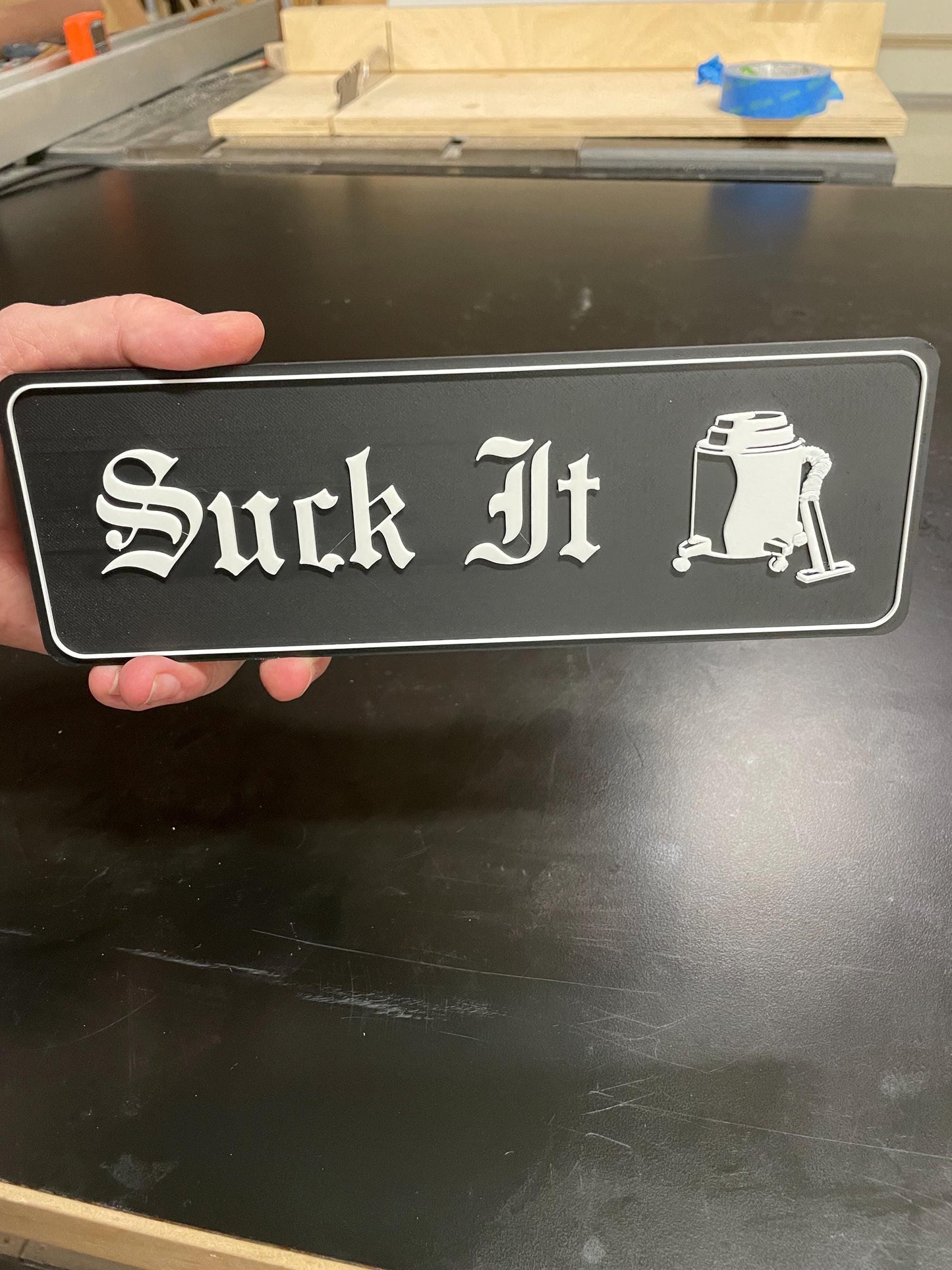 Suck It sign - The Office David Wallace Shop Vac