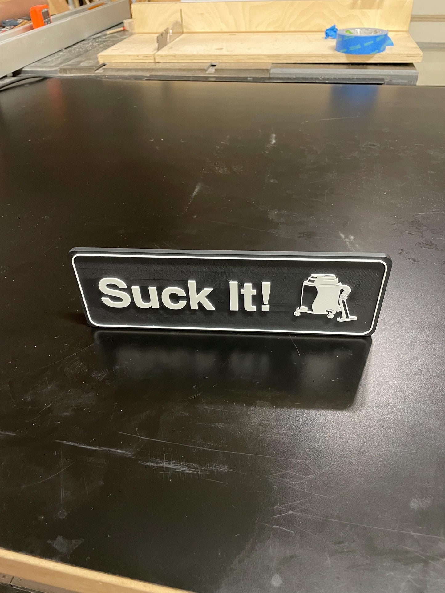 Suck It sign - The Office David Wallace Shop Vac