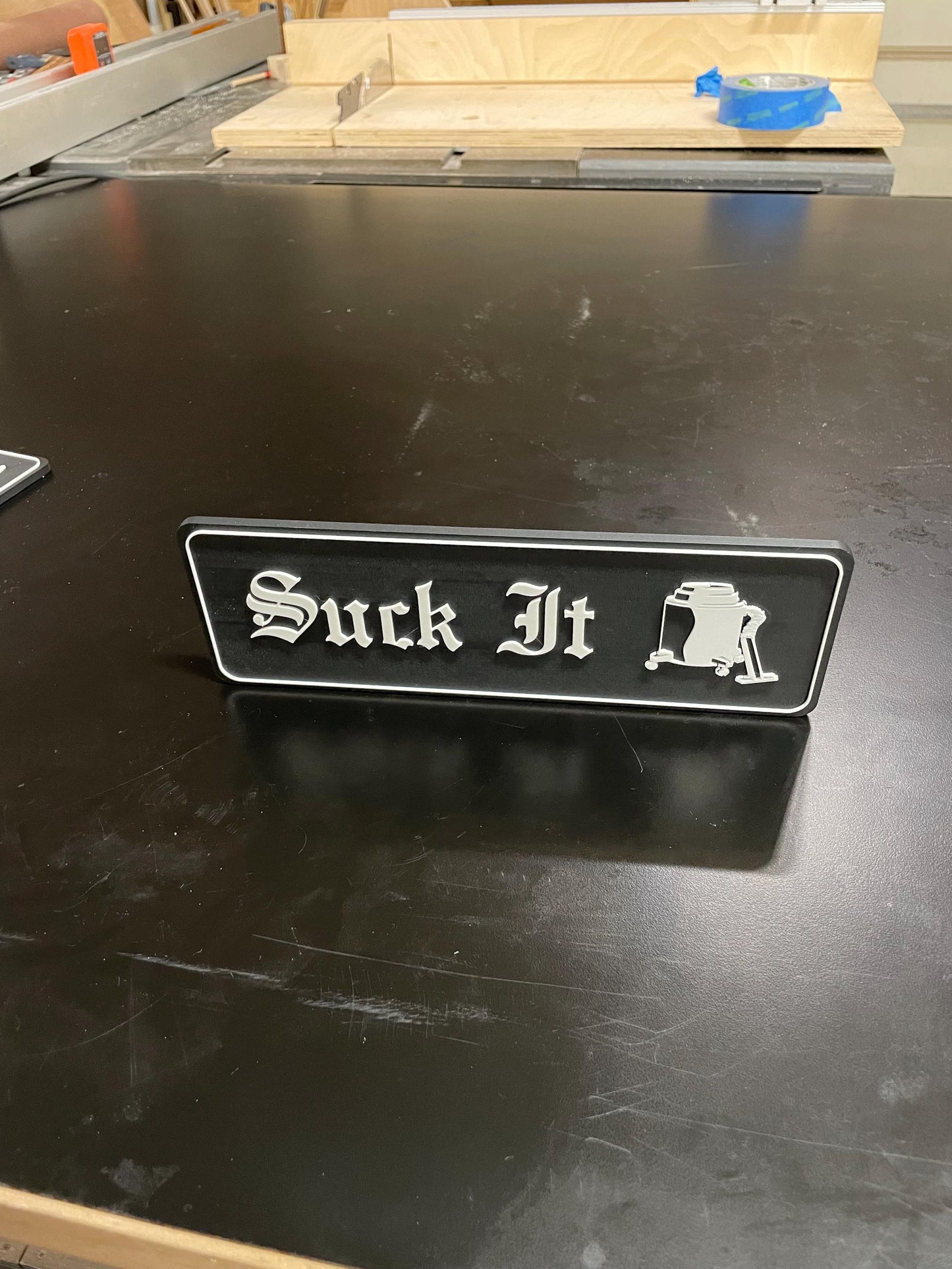 Suck It sign - The Office David Wallace Shop Vac