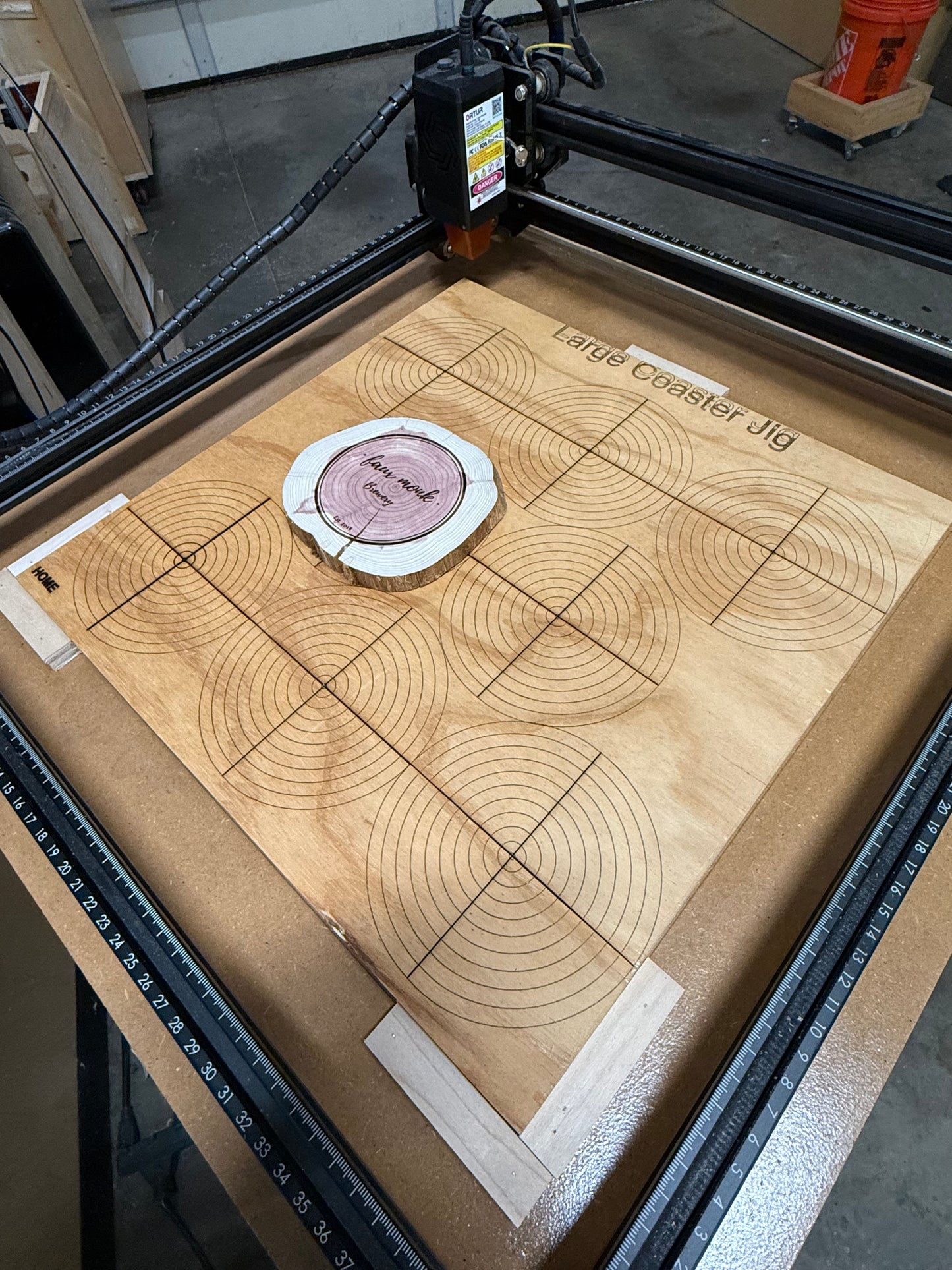 Coaster centering jig for laser engraving